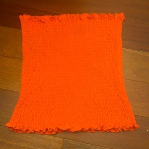 i am selling a tube top, it’s a very pretty orange! great quality,really cute on